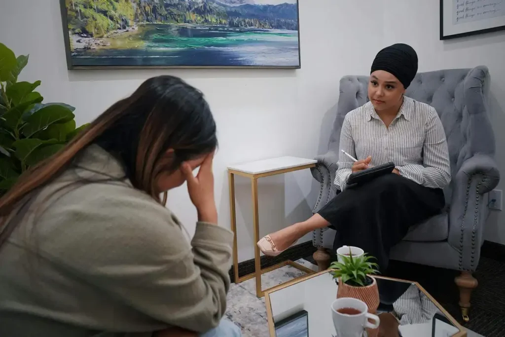 a female psychotherapist and female patient during one on one therapy