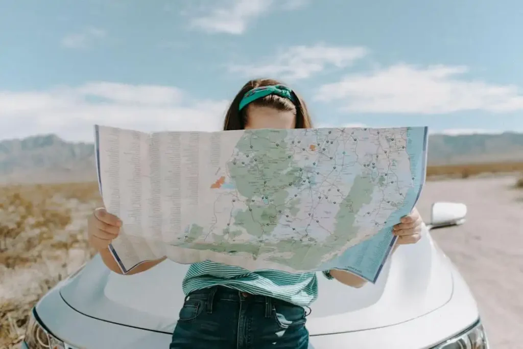 young woman looking at a map