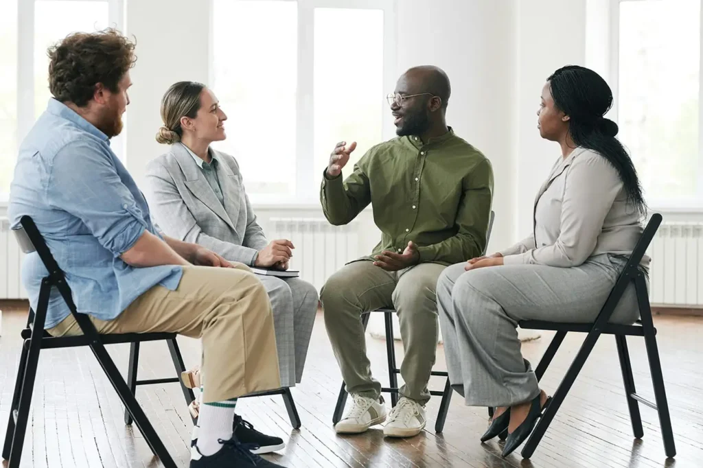 men and women during a group therapy in drug and alcohol detox rehab in corona southern california