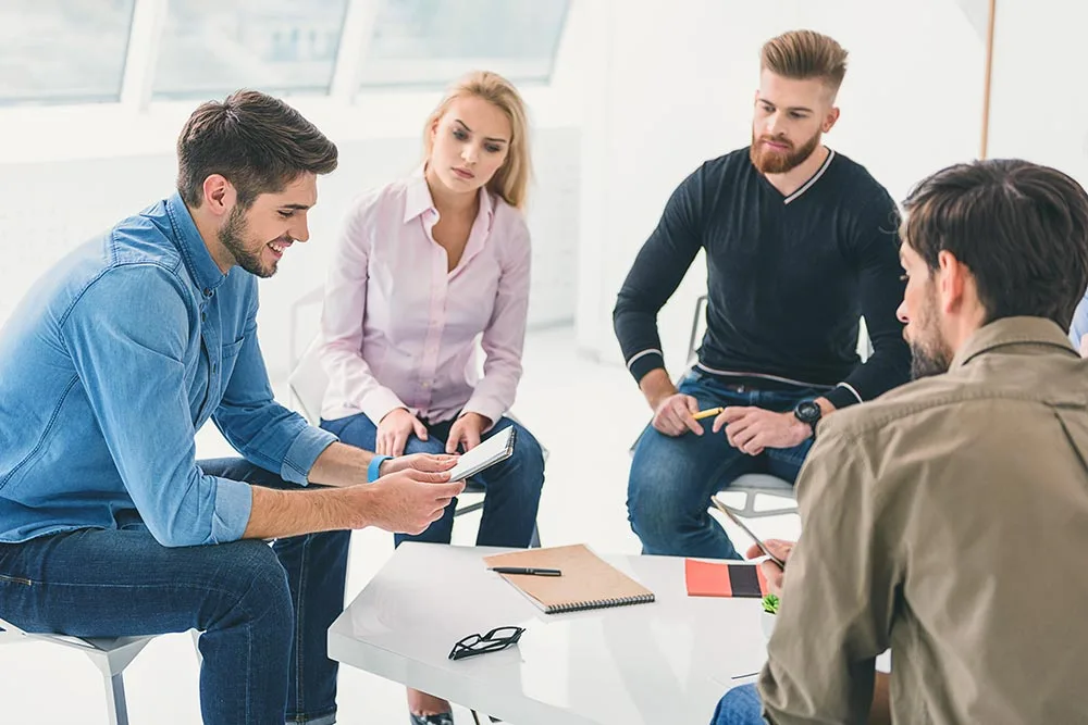 men and women during group therapy in drug rehab in corona southern california