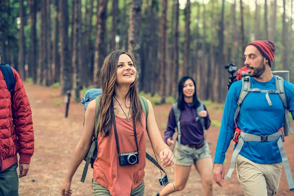 people walking in the forest during their recreational activity near drug rehab corona southern california