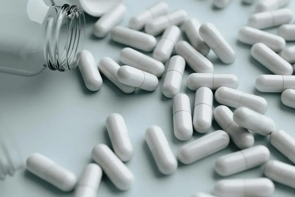 white capsules Naltrexone concept