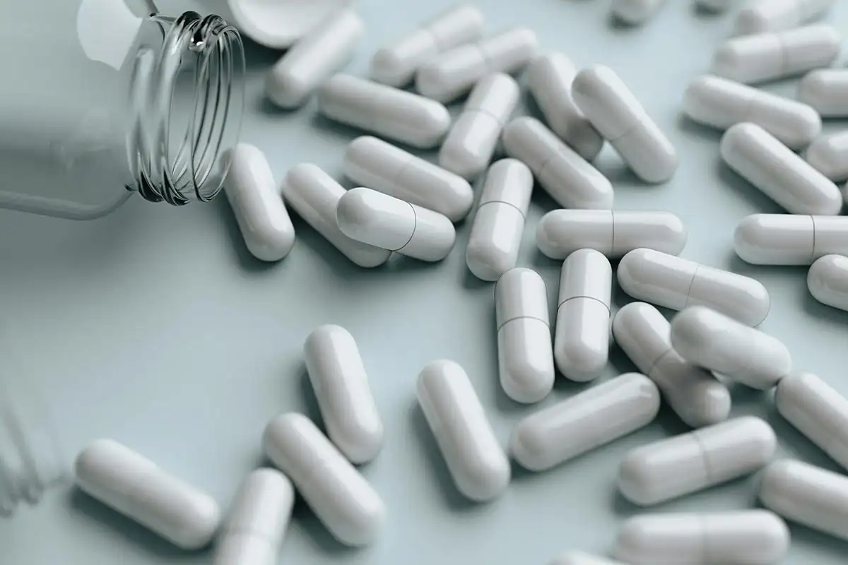 white capsules Naltrexone concept