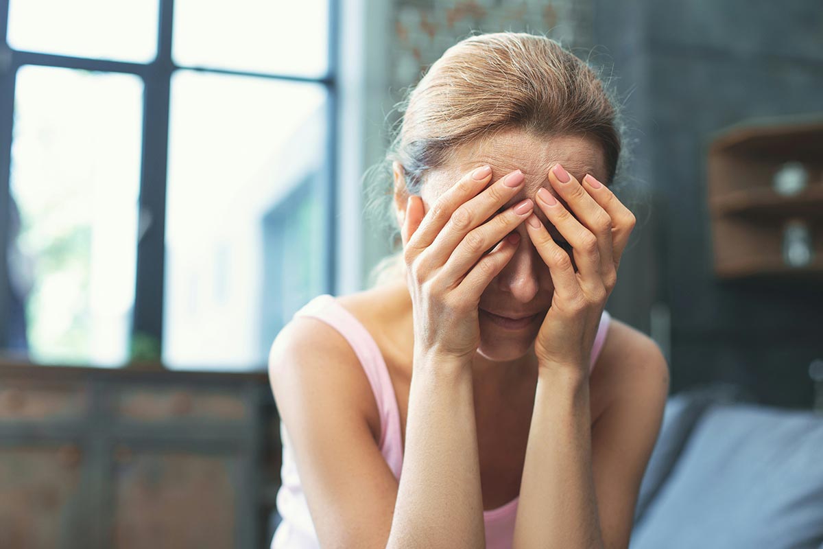 a woman feeling weak powerless