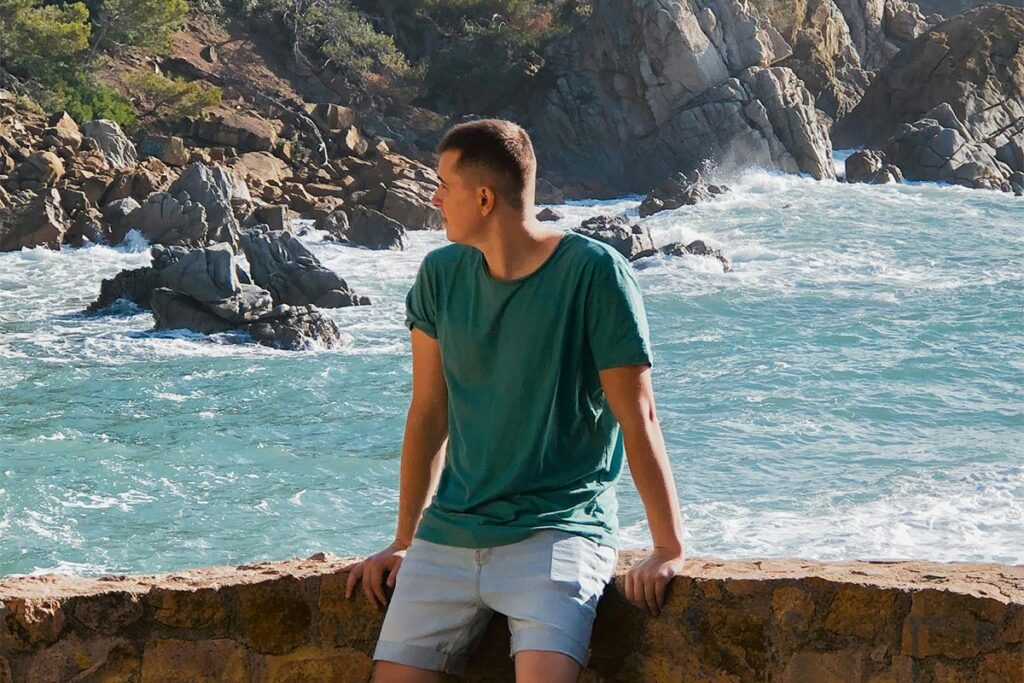 thoughtful man looking at the ocean
