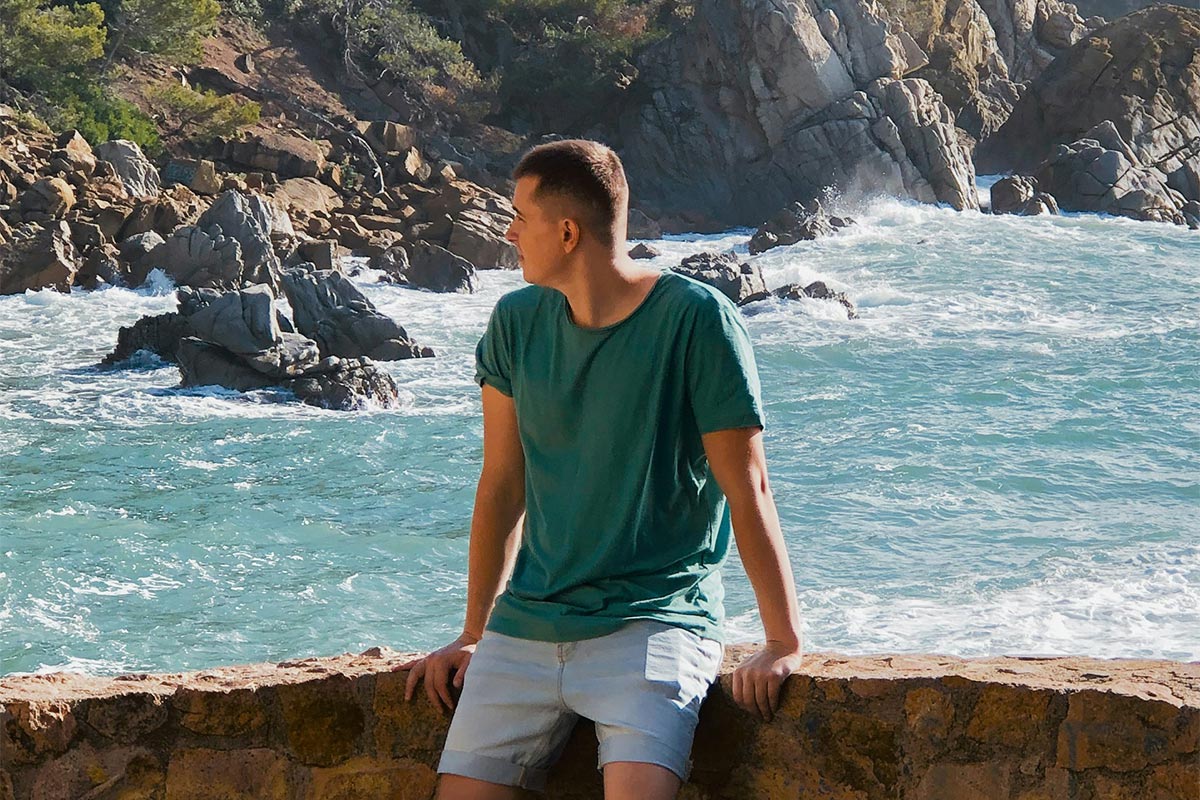 thoughtful man looking at the ocean