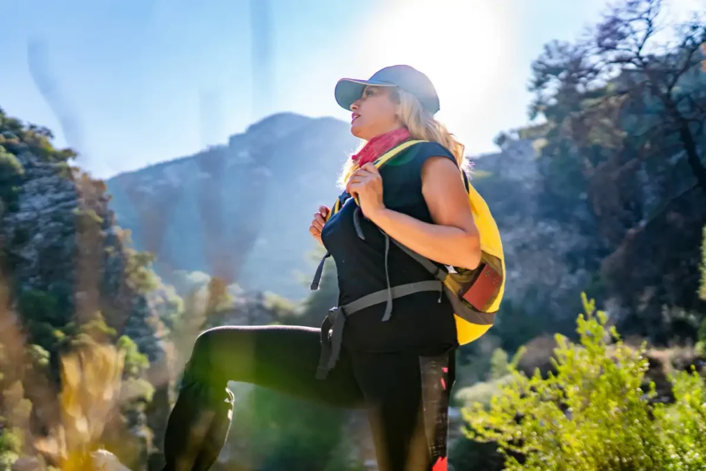 Adult woman hiking in the mountain