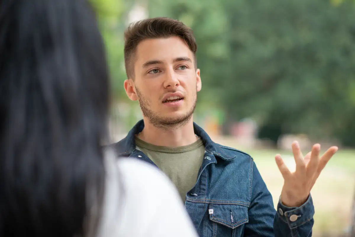 young adult male talking to his mother