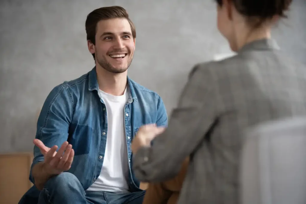 Psychologist talking with patient on therapy session