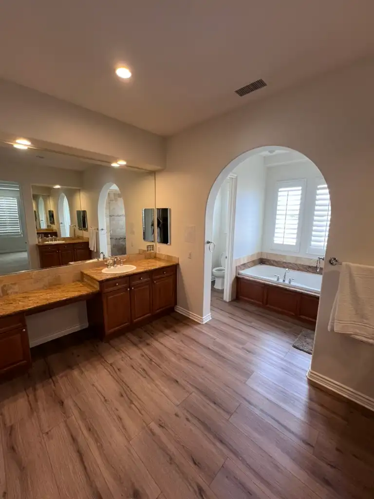 West Coast Detox Cleveland House Elegant bathroom interior with bathtub