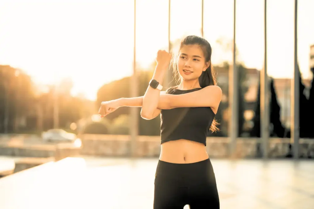 Active healthy asian woman exercising athletes in fitness clothes