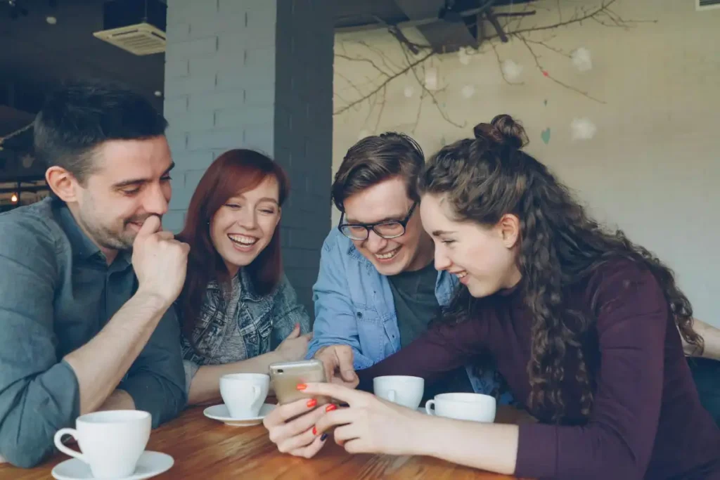 Social Gathering of Friends in a Cozy Cafe