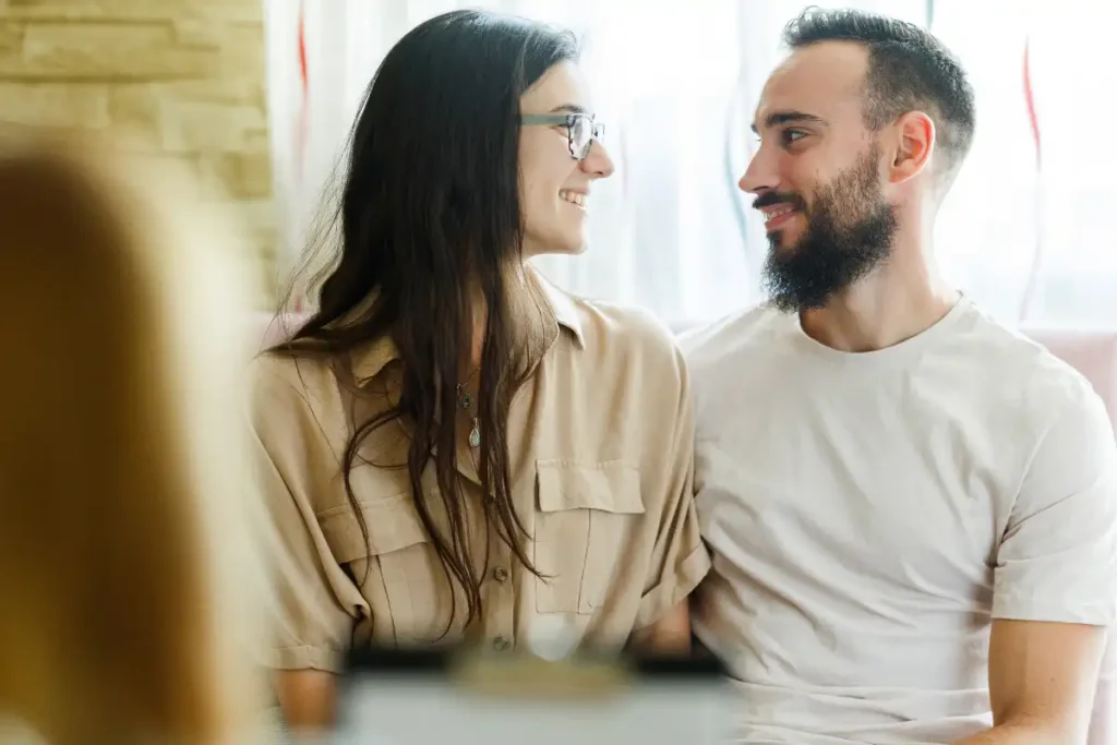 couple on therapy with a psychologist in session